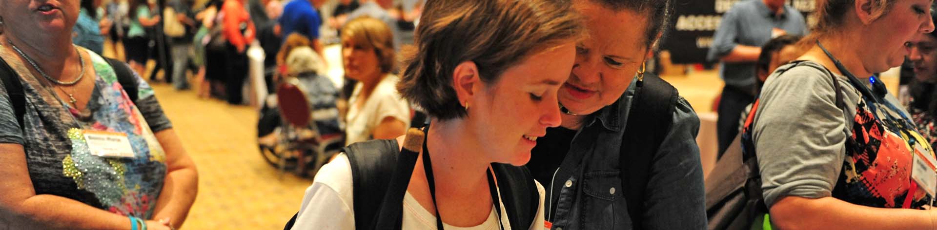 Blind members check out available products at the exhibit hall.